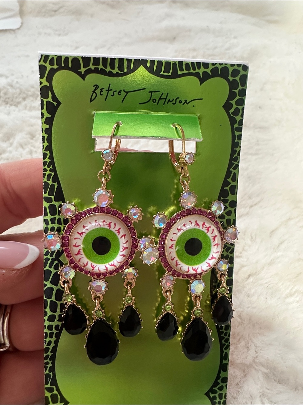 Betsey Johnson Evil Eye" dangle earrings feature a distinct eyeball motif